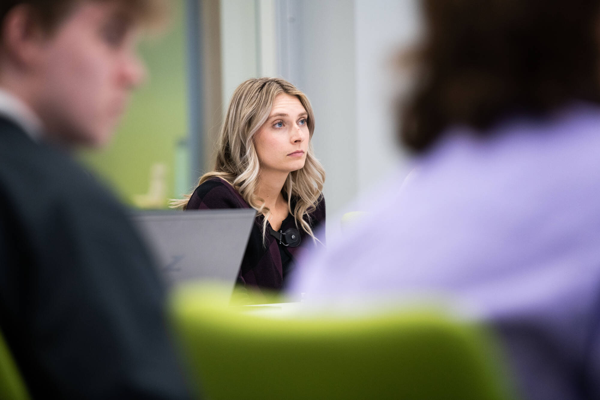 Student viewing screen, presentations occuring for a senior project